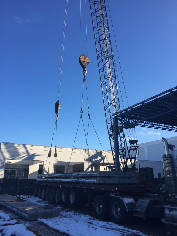 Setting roofing for a food producer.
