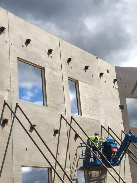 Setting in-place of Pre-Cast Concrete for a high school client.